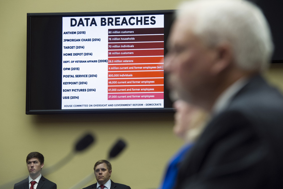 A chart of data breaches is shown on Capitol Hill in Washington, Tuesday, June 16, 2015, as witnesses testify before the House Oversight and Government Reform committee's hearing on the Office of Personnel Management (OPM) data breach. (AP Photo/Cliff Owen)