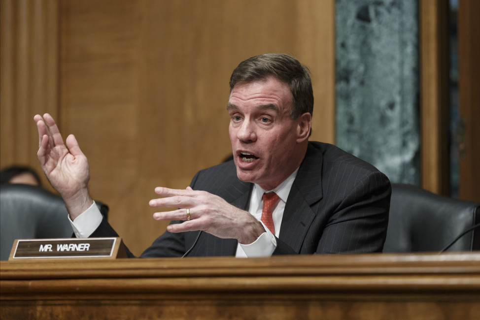 Sen. Mark Warner, D-Va., chairman of the Senate Banking Subcommittee on National Security and International Trade and Finance, leads a hearing on the recent incidents of mass credit card fraud following the theft of consumers’ data at retailers such as Target Corp and Neiman Marcus during the holiday shopping season, on Capitol Hill in Washington, Monday, Feb. 3, 2014. Hackers stole about 40 million debit and credit card numbers and also took personal information.  (AP Photo/J. Scott Applewhite)