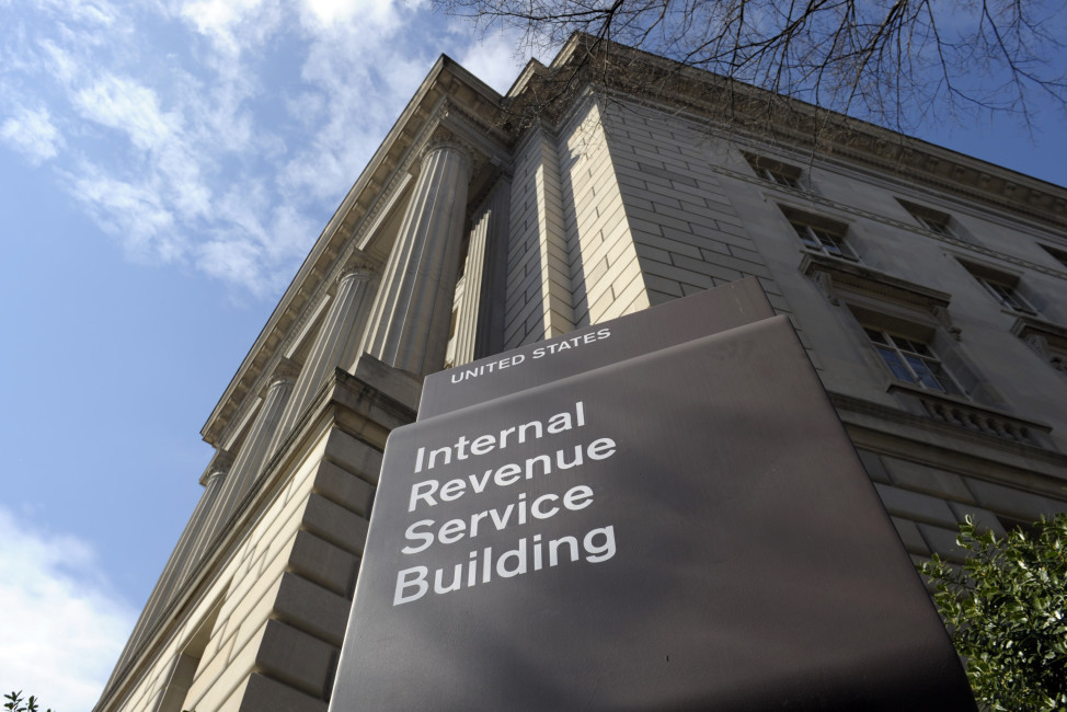 FILE - In this photo March 22, 2013 file photo, the exterior of the Internal Revenue Service (IRS) building in Washington. The IRS provided poor customer service during this year's tax filing season as taxpayers struggled with a rise in identity theft and complications related to President Barack Obama’s health law, a government watchdog said Wednesday. A new report by the National Taxpayer Advocate says the IRS has been hampered by budget cuts. (AP Photo/Susan Walsh, File)