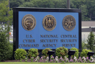 FILE - In this June 6, 2013, file photo, a sign stands outside the National Security Administration (NSA) campus on in Fort Meade, Md. The Obama administration has decided that the National Security Agency will soon stop using millions of American calling records it collected under a controversial program leaked by former agency contractor Edward Snowden. The Director of National Intelligence said July 27,  that as of Nov. 29, those records would no longer be examined in terrorism investigations, and would be destroyed as soon as possible. (AP Photo/Patrick Semansky, File)