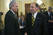 House Veterans Affairs Committee Chairman Jeff Miller, R-Fla., walks past Veterans Affairs Secretary Robert McDonald after a brief chat prior to the Committee's hearing the pending Veterans Affairs health care budget shortfall, on Capitol Hill in Washington, Wednesday, July 22, 2015. (AP Photo/Cliff Owen)