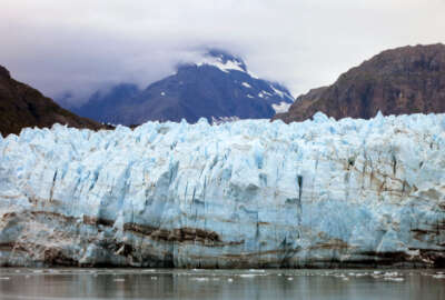 This July 30, 2014 photo shows Margerie Glacier, one of many glaciers that make up Alaska's Glacier Bay National Park. With melting glaciers and rising seas as his backdrop, President Barack Obama will visit Alaska next week to press for urgent global action to combat climate change, even as he carefully calibrates his message in a state heavily dependent on oil.   (AP Photo/Kathy Matheson)