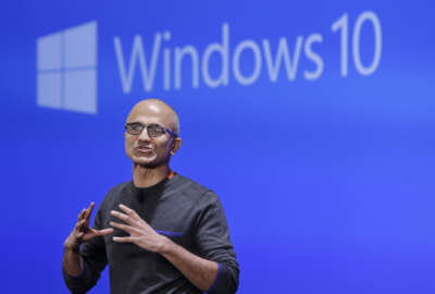 FILE - In this Jan. 21, 2015, file photo, Microsoft CEO Satya Nadella speaks at an event demonstrating the new features of Windows 10 at the company's headquarters in Redmond, Wash. When Chinese President Xi Jinping arrives in Washington state on his way to the other Washington (Washington, D.C.), he’ll be visiting the American state that does more business with his country than any other. Washington companies sold China more than $20 billion in products last year, from airplanes to wheat and apples. (AP Photo/Elaine Thompson, File)