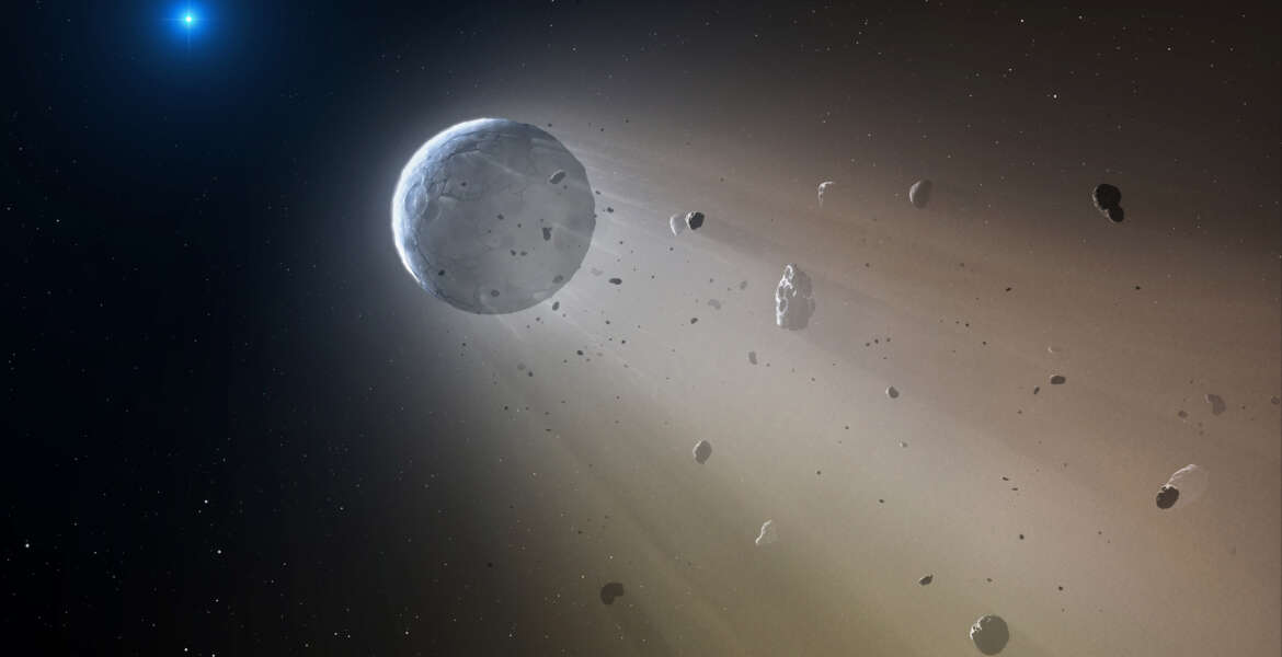 This artist's rendering provided by the Harvard-Smithsonian Center for Astrophysics shows an asteroid slowly disintegrating as it orbits a white dwarf star. On Wednesday, Oct. 21, 2015, researchers at the Harvard-Smithsonian Center for Astrophysics announced they have discovered a rocky object coming apart in a death spiral around a white dwarf star in the Constellation Virgo. They used NASA's Kepler spacecraft to make the discovery, then followed up with ground observations. (Mark A. Garlick/Harvard-Smithsonian Center for Astrophysics via AP)