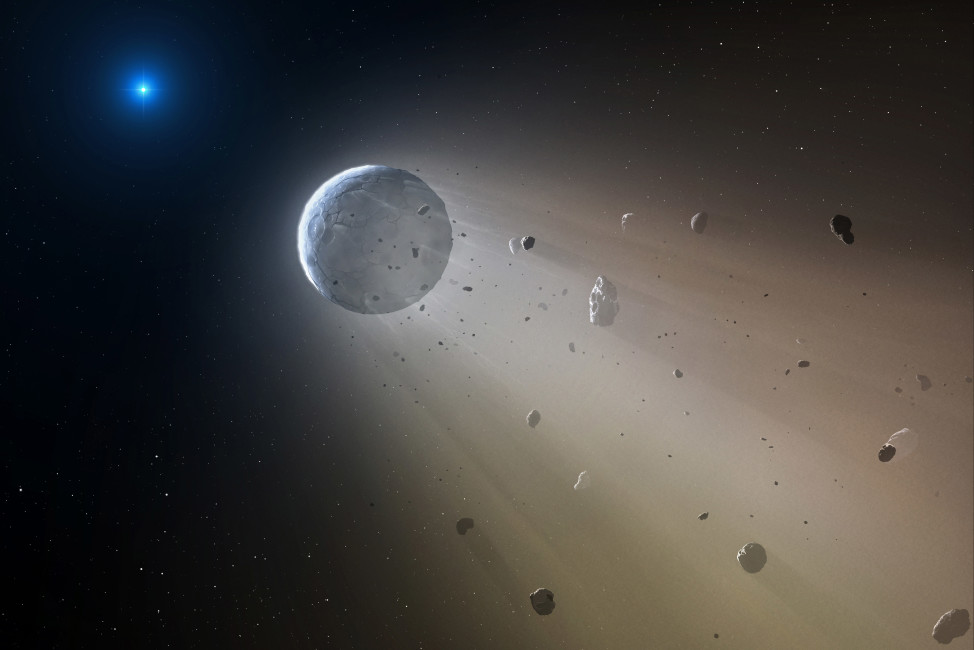 This artist's rendering provided by the Harvard-Smithsonian Center for Astrophysics shows an asteroid slowly disintegrating as it orbits a white dwarf star. On Wednesday, Oct. 21, 2015, researchers at the Harvard-Smithsonian Center for Astrophysics announced they have discovered a rocky object coming apart in a death spiral around a white dwarf star in the Constellation Virgo. They used NASA's Kepler spacecraft to make the discovery, then followed up with ground observations. (Mark A. Garlick/Harvard-Smithsonian Center for Astrophysics via AP)