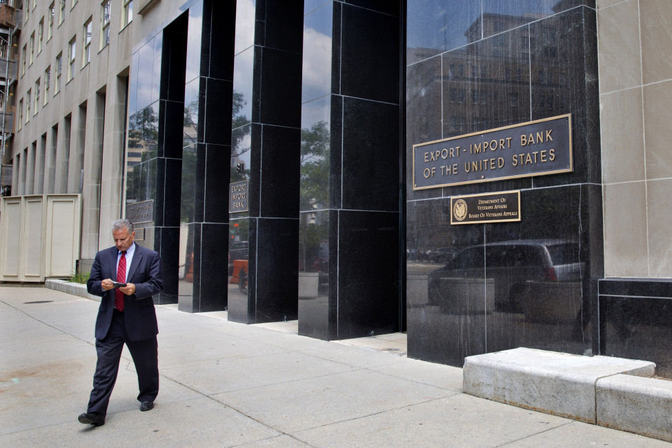 FILE - In this July 28, 2015, file photo, a man walks out of the Export-Import Bank of the United States in Washington. A strong coalition of establishment-backed Republicans and House Democrats voted overwhelmingly Oct. 27 to revive the Export-Import Bank, dealing a defeat to tea party conservatives and Speaker-to-be Paul Ryan. (AP Photo/Jacquelyn Martin, File)