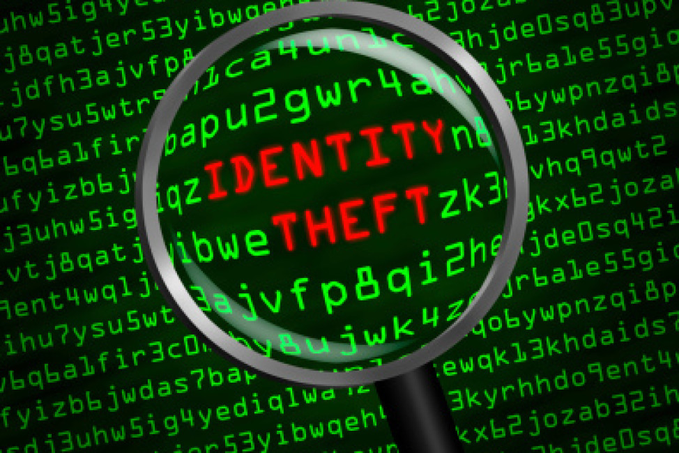 Identity Theft revealed in computer code through magnifying glass