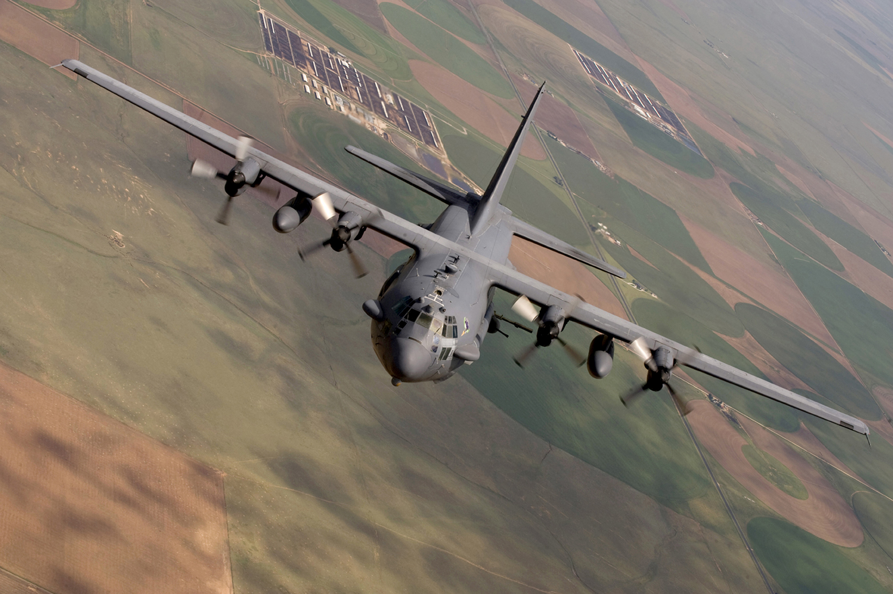 This photo provided by the U.S. Air Force, taken Aug. 11, 2010, shows an AC-130 Spectre from the 16th Special Operations Squadron flying a training mission at Cannon Air Force Base, N. M. The Army Green Berets who called in the deadly strike on the Doctors without Borders trauma center in Afghanistan were aware it was a functioning hospital but believed it was under Taliban control, raising questions about whether the air strike violated international law. (U.S. Air Force photo/Master Sgt. Jack Braden via AP)