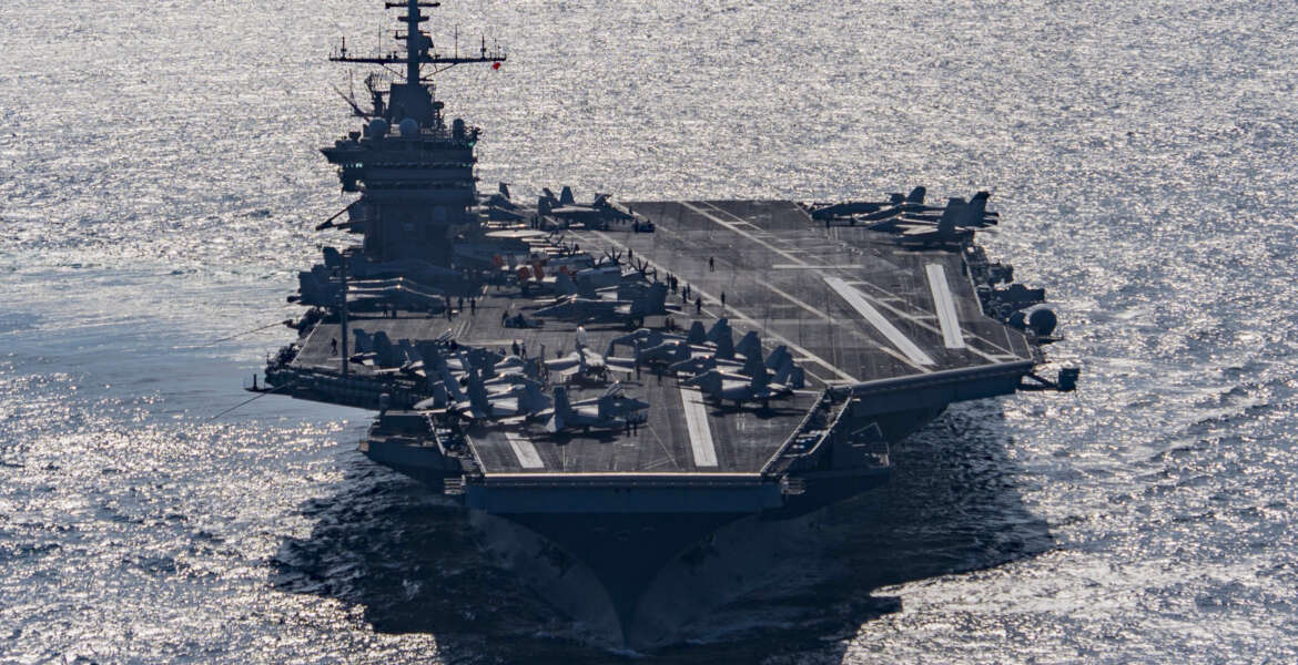 In this Friday, Dec. 25, 2015 photo released by the U.S. Navy, the aircraft carrier USS Harry S. Truman navigates the Gulf of Oman. Iranian naval vessels conducted rocket tests last week near the USS Harry S. Truman aircraft carrier, the USS Bulkeley destroyer and a French frigate, the FS Provence, and commercial traffic passing through the Strait of Hormuz, the American military said Wednesday, Dec. 30, 2015 causing new tension between the two nations after a landmark nuclear deal. (Mass Communication Specialist 3rd Class J. M. Tolbert/ U.S. Navy via AP) MANDATORY CREDIT