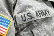 USA flag and U.S. Army patch on solder's uniform