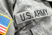 USA flag and U.S. Army patch on solder's uniform