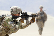 Pfc. Charles Hollembeak, a 101st Airborne Division infantryman, fires an M4 carbine during partnered live-fire range training May 29, 2015, at Tactical Base Gamberi in eastern Afghanistan. (U.S. Army photo by Capt. Charlie Emmons, TAAC-E Public Affairs)