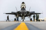 An F-35A Lightning II team parks the aircraft for the first time at Mountain Home Air Force Base, Idaho, Feb. 8, 2016. The aircraft arrived at the base to conduct operational testing in order to determine its combat capabilities. (U.S. Air Force photo/Airman 1st Class Connor J. Marth)