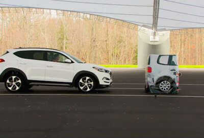 In this frame grab from video provided by the  Insurance Institute for Highway Safety (IIHS), taken in 2015, a vehicle closes in on a Strikeable Surrogate Vehicle (SSV) at the IIHS Vehicle Research Center in Ruckersville, Va. Federal regulators and the auto industry are taking a more lenient approach than safety advocates would like to phasing in automatic braking systems for passenger cars, according to the official records of their closed-door negotiations. Systems that automatically apply brakes to prevent or mitigate collisions, rather than waiting for the driver to act, are the most important safety technology available today that’s not already required in cars. (Insurance Institute for Highway Safety via AP)