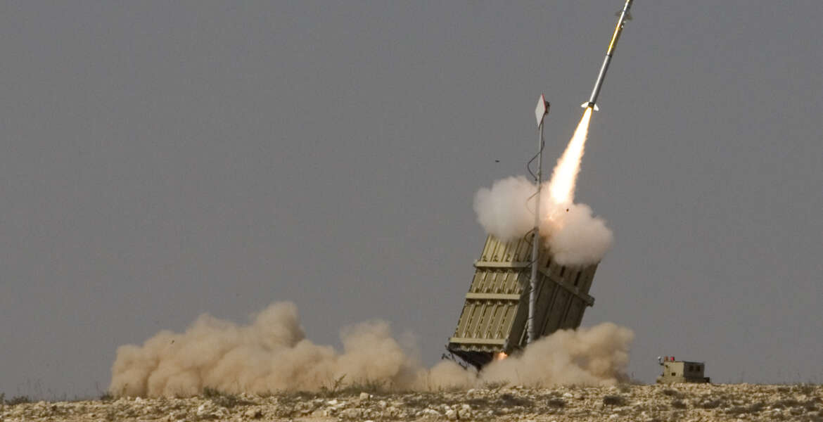 FILE - In this Aug. 21, 2011 file photo, a rocket is launched from a new Israeli anti-missile system known as Iron Dome in order to intercept a rocket fired by Palestinian militants from the Gaza Strip, in the southern city of Beersheba, Israel. Twenty five years after the first U.S. Marines swept across the border into Kuwait in the 1991 Gulf War, American forces find themselves battling the extremist Islamic State group, born out of al-Qaida, in the splintered territories of Iraq and Syria. In Israel, the memory of Iraqi Scud missile fire prompted the military to speed up a missile-defense program that included the development of its Iron Dome rocket-defense system with the help of the Americans. (AP Photo/Dan Balilty, File)