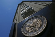 The seal a fixed to the front of the Department of Veterans Affairs building in Washington, Friday, June 21, 2013. The number of military suicides is nearly double that of a decade ago when the U.S. was just a year into the Afghan war and hadnt yet invaded Iraq. While the pace is down slightly this year, it remains worryingly high. The U.S. military and the Department of Veterans Affairs (VA) acknowledge the grave difficulties facing active-duty and former members of the armed services who have been caught up in the more-than decade-long American involvement in wars in Iraq and Afghanistan.  (AP Photo/Charles Dharapak)