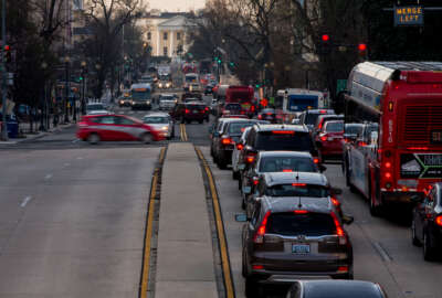The White House is visible as morning traffic builds along 16th Street Northwest, in Washington, Wednesday, March 16, 2016. The Metro subway system that serves the nation's capital and its Virginia and Maryland suburbs shut down for a full-day for an emergency safety inspection of its third-rail power cables. Making for unusual commute, as the lack of service is forcing some people on the roads, while others are staying home or teleworking. (AP Photo/Andrew Harnik)