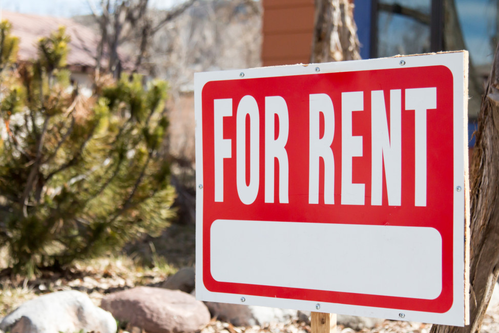 Blank for rent sign in front of a home