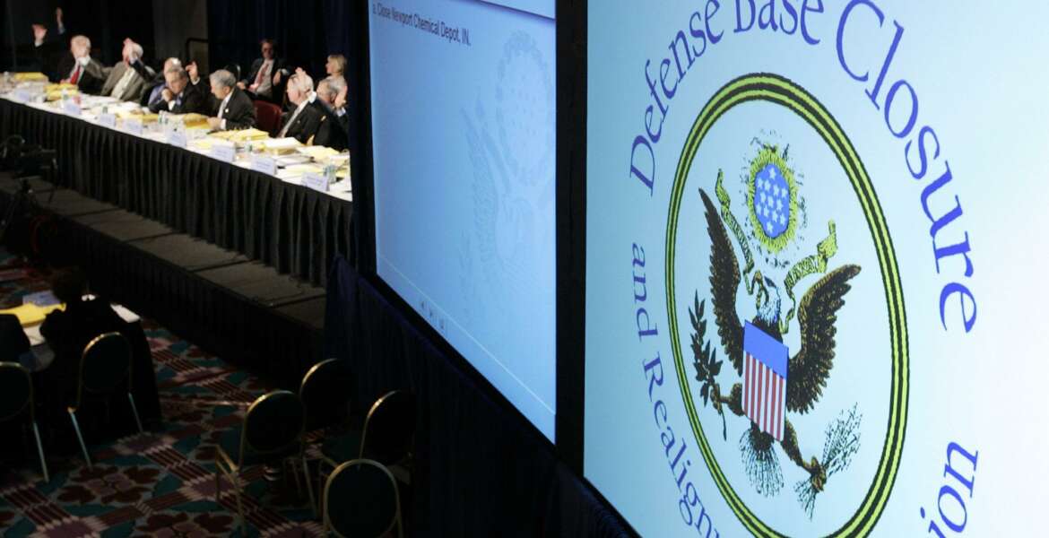 Defense Base Closure and Realignment Commission, casts vote during final deliberations, Arlington, Virginia, photo