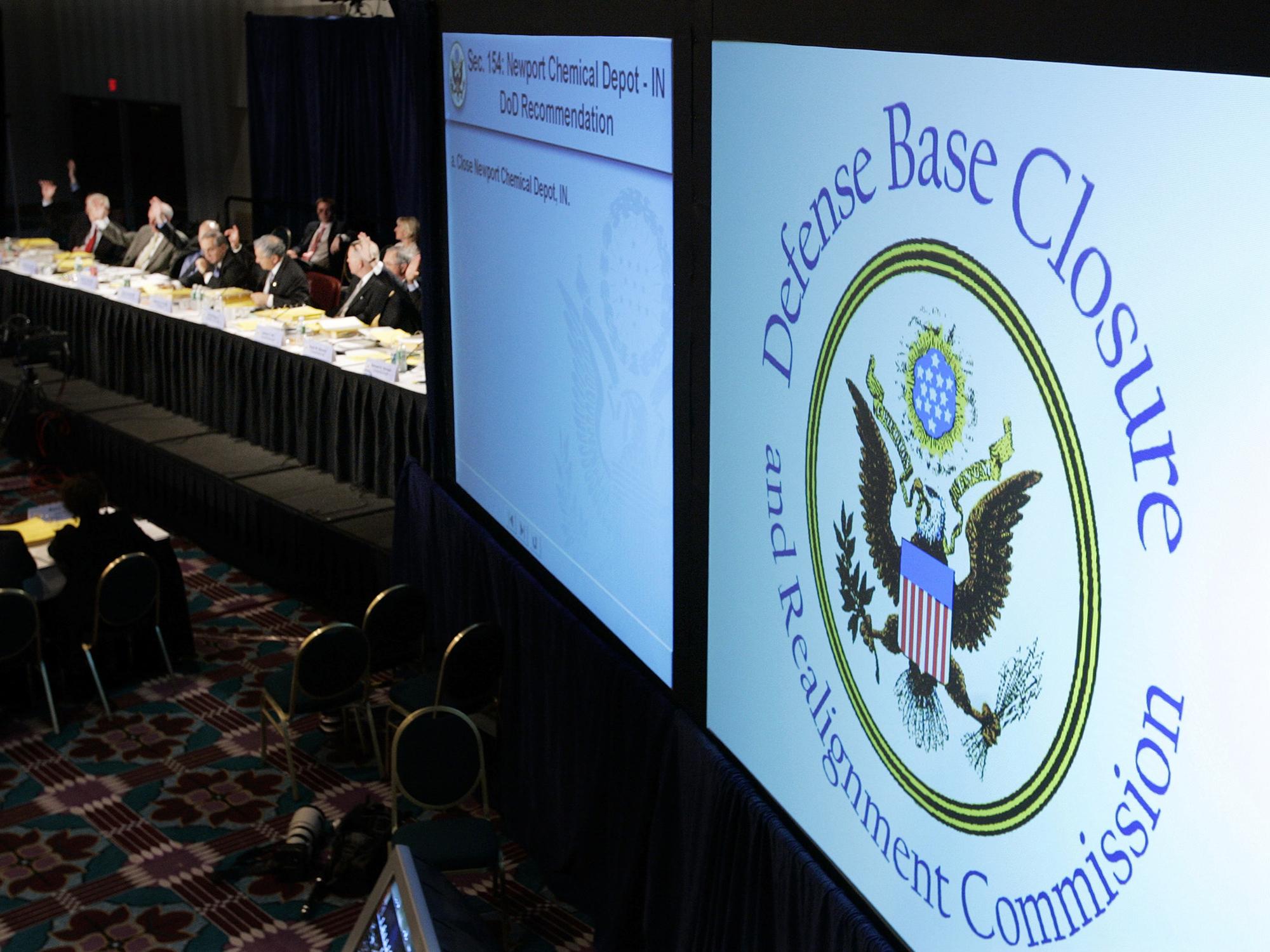Defense Base Closure and Realignment Commission, casts vote during final deliberations, Arlington, Virginia, photo
