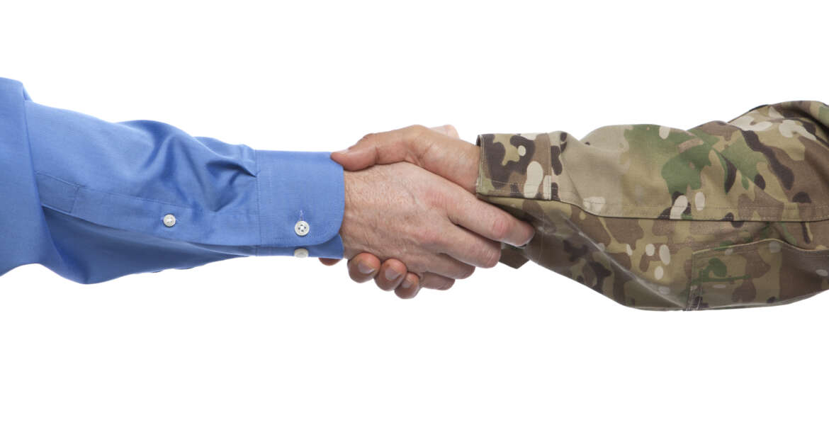 Military and Businessman Handshake