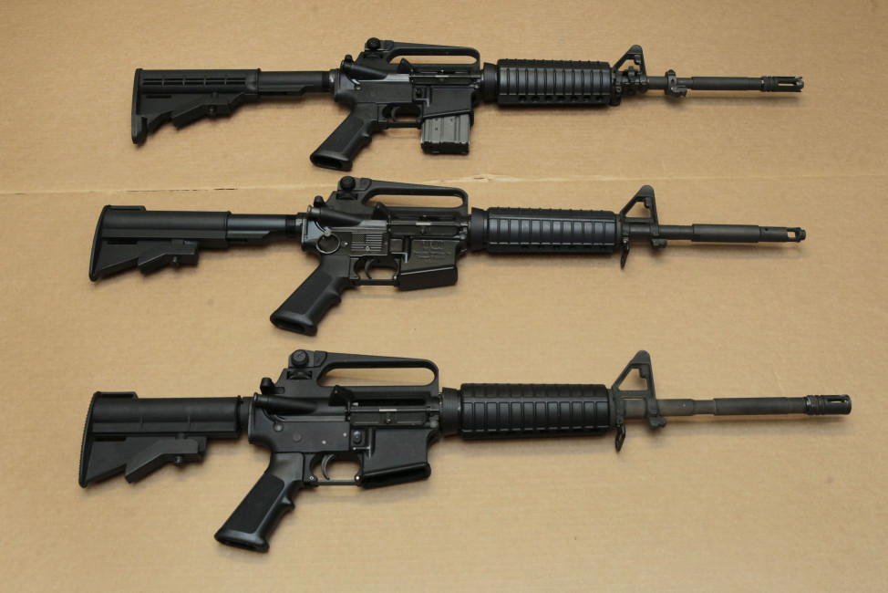 FILE -- In this Aug. 15, 2012 file photo, three variations of the AR-15 assault rifle are displayed at the California Department of Justice in Sacramento, Calif. While the guns look similar, the bottom version is illegal in California because of its quick reload capabilities. Omar Mateen used an AR-15 that he purchased legally when he killed 49 people in an Orlando nightclub over the weekend President Barack Obama and other gun control advocates have repeatedly called for reinstating a federal ban on semi-automatic assault weapons that expired in 2004, but have been thwarted by Republicans in Congress. (AP Photo/Rich Pedroncelli,file)