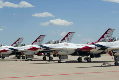 Air Force Thunderbird jets sit on the tarmac at Peterson Air Base, Colo., Thursday, June 2, 2016. An Air Force Thunderbird jet crashed Thursday in Colorado just after a flyover at a graduation ceremony for Air Force Academy cadets where President Barack Obama had spoken. (AP Photo/Pablo Martinez Monsivais)