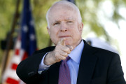 Sen. John McCain, R-Ariz, acknowledges a fellow Navy veteran during a Phoenix Memorial Day Ceremony at the National Memorial Cemetery of Arizona, Monday, May 30, 2016, in Phoenix.  At age 79, running what may be his last campaign, McCain finds himself on uncertain terrain.  (AP Photo/Ralph Freso)