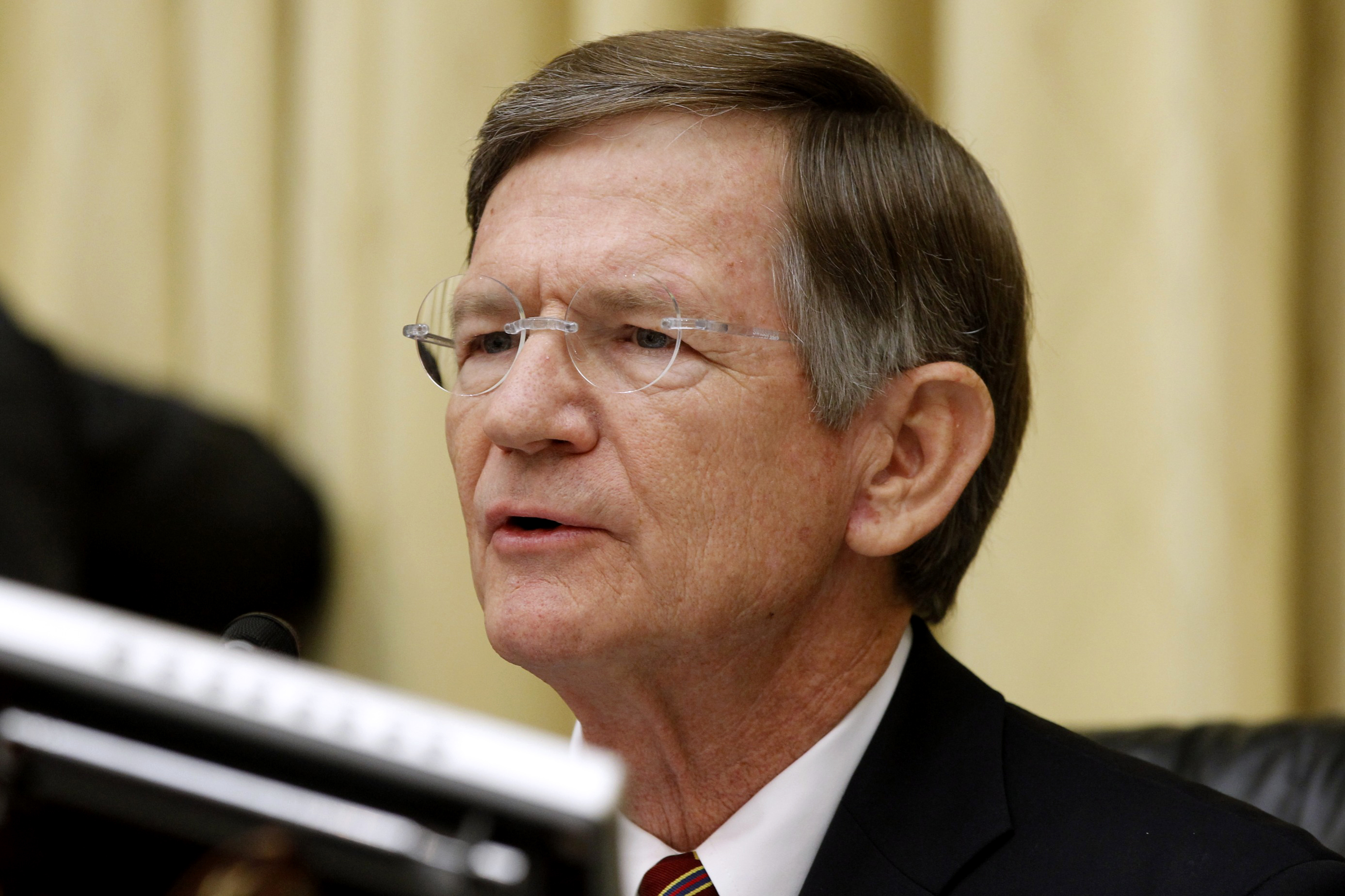 FILE - In this June 7, 2012 file photo,  House Science Committee Chairman Rep. Lamar Smith, R-Texas speaks on Capitol Hill in Washington. Escalating a political fight over global warming, Smith issued subpoenas Wednesday, July 13, 2016, to two Democratic state attorneys general, seeking records about their investigation into whether Exxon Mobil misled investors about global warming. (AP Photo/Charles Dharapak, File)