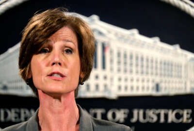 FILE - In this June 28, 2016 file photo, Deputy Attorney General Sally Yates speaks during a news conference at the Justice Department in Washington. The Justice Department says it’s phasing out its relationships with private prisons after a recent audit found the private facilities have more safety and security problems than ones run by the government. Yates instructed federal officials to significantly reduce reliance on private prisons.  (AP Photo/J. David Ake, File)