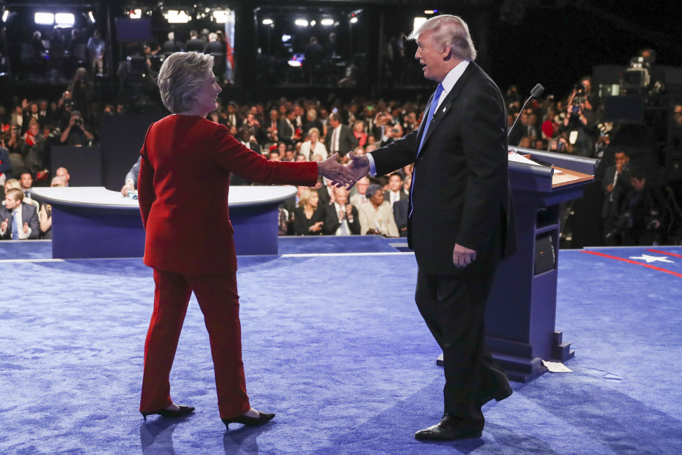 Democratic presidential nominee Hillary Clinton shakes hands with Republican presidential nominee Donald Trump after the presidential debate at Hofstra University in Hempstead, N.Y., Monday, Sept. 26, 2016. (Joe Raedle/Pool via AP)