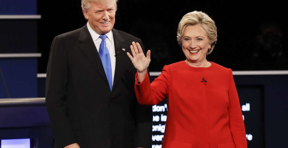 Republican presidential nominee Donald Trump and Democratic presidential nominee Hillary Clinton are introduced during the presidential debate at Hofstra University in Hempstead, N.Y., Monday, Sept. 26, 2016. (AP Photo/David Goldman)