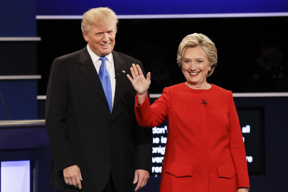 Republican presidential nominee Donald Trump and Democratic presidential nominee Hillary Clinton are introduced during the presidential debate at Hofstra University in Hempstead, N.Y., Monday, Sept. 26, 2016. (AP Photo/David Goldman)