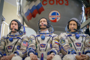 Expedition 49 NASA astronaut Shane Kimbrough, left, Russian cosmonaut Sergei Ryzhikov of Roscosmos, center, and Russian cosmonaut Andrey Borisenko of Roscosmos answer questions from the press outside the Soyuz simulator ahead of their Soyuz qualification exams, Wednesday, Aug. 31, 2016, at the Gagarin Cosmonaut Training Center (GCTC) in Star City, Russia. Photo Credit: (NASA/Bill Ingalls)