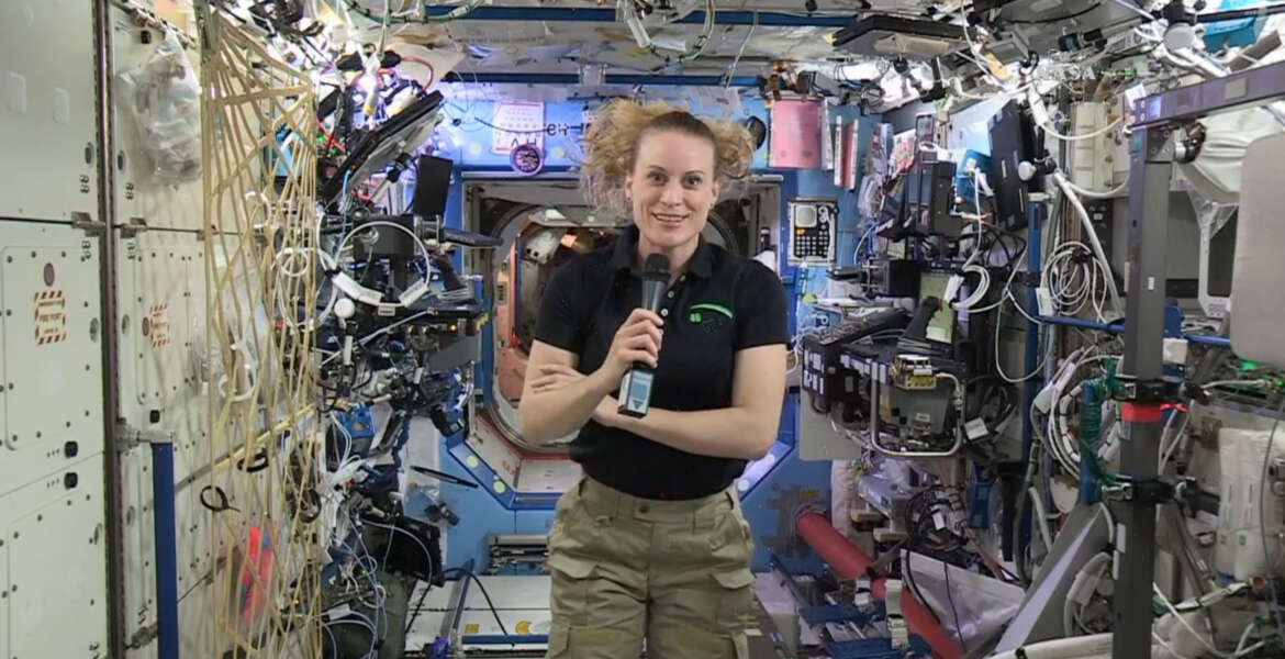 In this image from video made available by NASA, U.S. astronaut Kate Rubins speaks aboard the International Space Station during an interview on Thursday, Sept. 22, 2016. Rubins said that she doesn’t know yet whether she’ll return to Earth in late October as planned. The Russians have delayed the next crew launch for technical reasons. (NASA via AP)