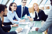 Happy business team planning work together at the table