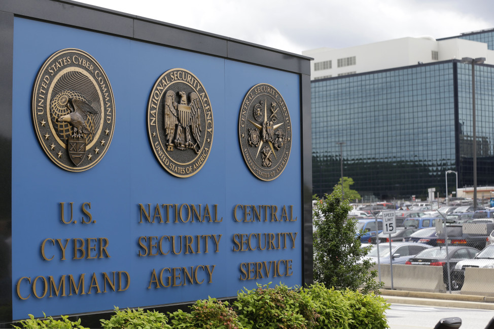 FILE - In this June 6, 2013 file photo, the sign outside the National Security Agency (NSA) campus in Fort Meade, Md. A contractor for the National Security Agency has been arrested on charges that he illegally removed highly classified information and stored the material in his house and car, federal prosecutors announced Wednesday, Oct. 5, 2016. Harold Thomas Martin III, 51, of Glen Burnie, Maryland, was arrested by the FBI in August after authorities say he admitted to having taken government secrets. A defense attorney said Martin did not intend to betray his country.  (AP Photo/Patrick Semansky, File)