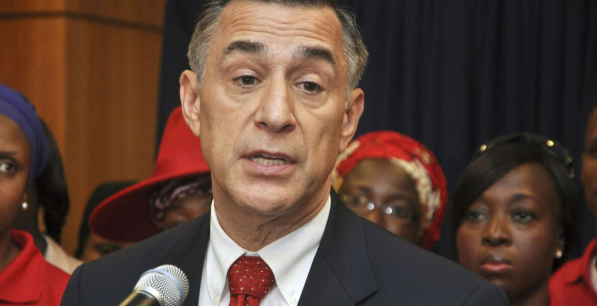 FILE - This Tuesday, Aug. 4, 2015 file photo U.S. Rep. Darrell Issa speaks during a news conference at the U.S embassy in Abuja Nigeria. Republican Issa, the wealthiest member of Congress with more than $250 million, rarely spent a penny on television ads or yard signs as he cruised to victory in past elections. Not this time. The eight-term lawmaker and chief antagonist of President Barack Obama and Democrat Hillary Clinton faces a tough challenge from Marine-turned-lawyer Doug Applegate. (AP Photo/Olamikan Gbemiga, File)