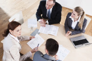 Four businesspeople having a meeting in conference room