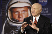 FILE - In this Feb. 20, 2012, file photo, U.S. Sen. John Glenn talks with astronauts on the International Space Station via satellite before a discussion titled "Learning from the Past to Innovate for the Future" in Columbus, Ohio. Glenn, who was the first U.S. astronaut to orbit Earth and later spent 24 years representing Ohio in the Senate, has died at 95. (AP Photo/Jay LaPrete, File)