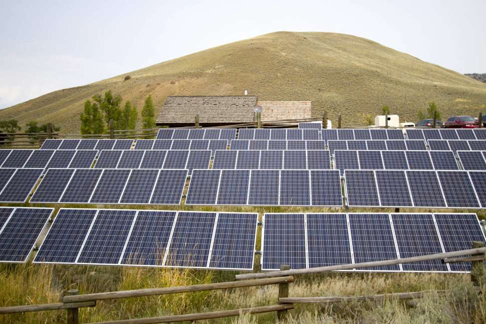 FILE - This Aug. 27, 2015, file photo shows a solar power array that is part of sustainability improvements at the Lamar Buffalo Ranch in Yellowstone National Park, Wyo. In recent years, huge solar and wind farms have sprouted up on public desert land in the Western United States buoyed by generous federal tax credits. A group of lawmakers in the most Republican statehouse in the country is bucking the nationwide trend toward stricter renewable energy requirements with a plan to do the opposite: Require utilities to get their electricity from fossil fuels or face fines. (Ryan Jones/Jackson Hole News &amp; Guide via AP, File)