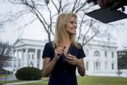 President Donald Trump's adviser Kellyanne Conway gets ready to go on television outside the White House, Sunday, Jan. 22, 2017, in Washington. (AP Photo/Manuel Balce Ceneta)