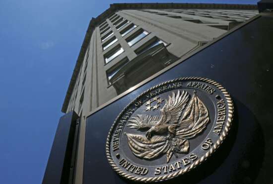 FILE - In this June 21, 2013, file photo, the seal a fixed to the front of the Department of Veterans Affairs building in Washington. Veterans health care remains a 