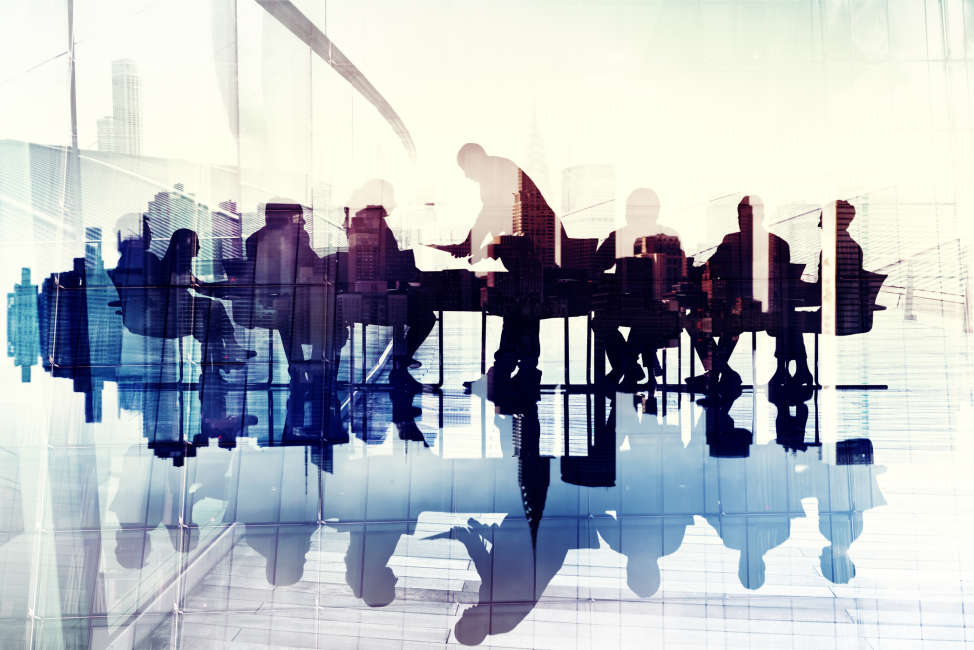 Abstract Image of Business People's Silhouettes in a Meeting