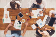 Group of busy business people working in office, top view