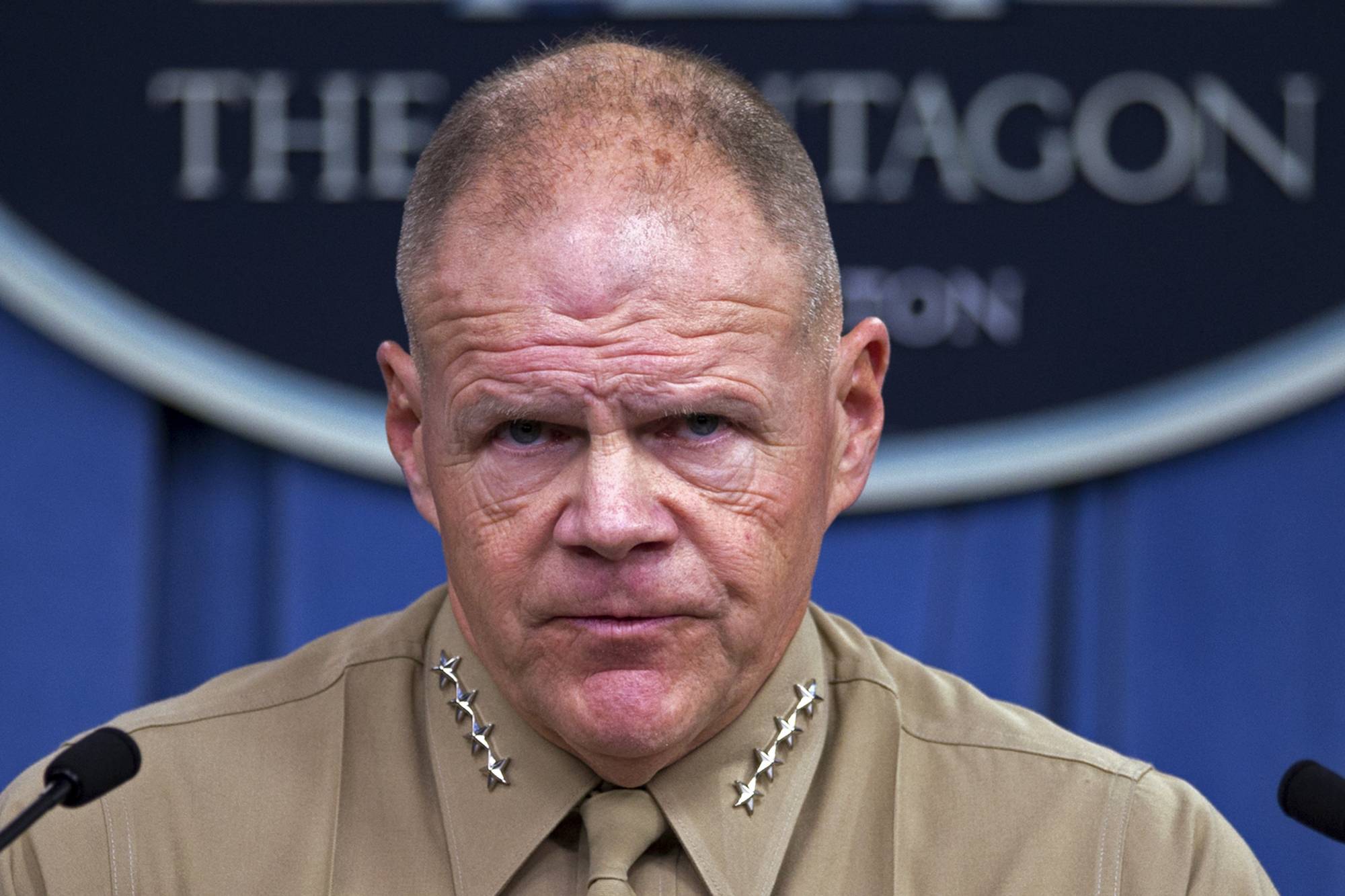 Marine Corps Commandant Gen. Robert Neller pauses during a news conference at the Pentagon, Friday, March 10, 2017. Neller said that an investigation into reports that nude photos of female service members are being secretly posted online without their permission has an effect on the entire Marine Corps and must be done carefully. (AP Photo/Cliff Owen)