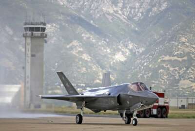 FILE - This Sept. 2, 2015, file photo shows an F-35 jet arriving at its new operational base at Hill Air Force Base in Utah. The U.S. and its Asia-Pacific allies are rolling out their new stealth fighter jet, a cutting-edge plane that costs about $100 million each. (AP Photo/Rick Bowmer, File)