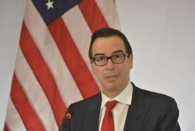 U.S. Treasury Secretary Steven Mnuchin speaks at a news conference during the G20 finance ministers meeting in Baden-Baden, southern Germany, March 17, 2017. (Uwe Anspach/dpa via AP)