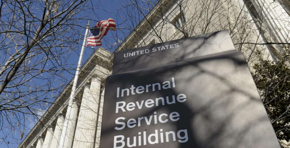 FILE - In this March 22, 2013 file photo, the exterior of the Internal Revenue Service building in Washington. As millions of Americans file their income tax returns, their chances of getting audited by the IRS have rarely been so low. The number of people audited by the IRS last year dropped for the sixth straight year, to just over 1 million. The last time so few people were audited was 2004, when the population was significantly smaller.  (AP Photo/Susan Walsh, File)