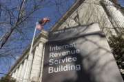 FILE - In this March 22, 2013 file photo, the exterior of the Internal Revenue Service building in Washington. As millions of Americans file their income tax returns, their chances of getting audited by the IRS have rarely been so low. The number of people audited by the IRS last year dropped for the sixth straight year, to just over 1 million. The last time so few people were audited was 2004, when the population was significantly smaller.  (AP Photo/Susan Walsh, File)